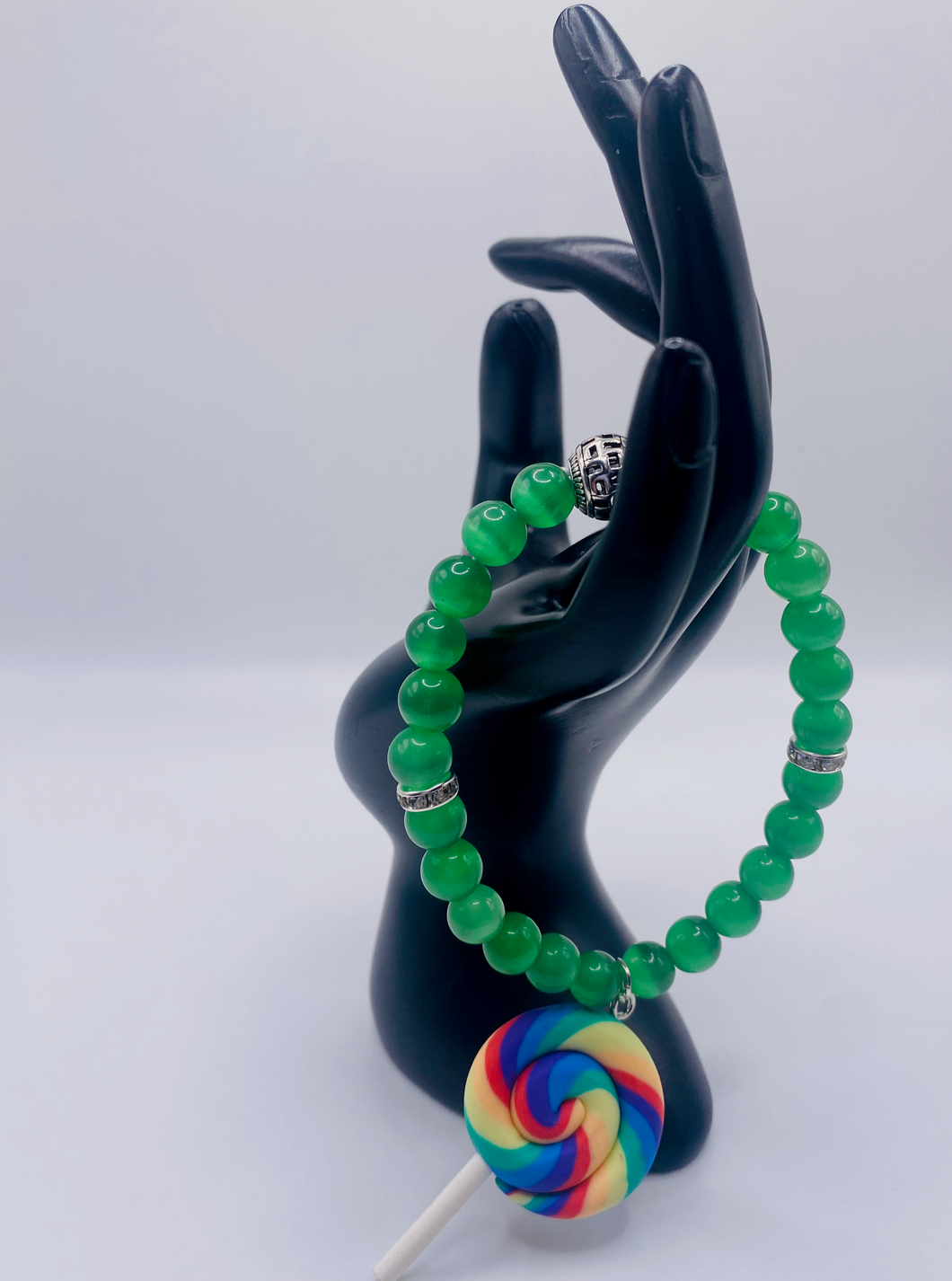 Green Cat Eye w/ Lollipop Charm